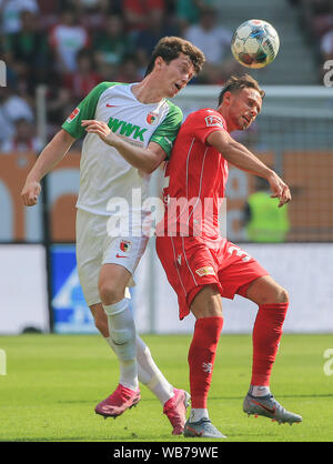 Augsburg, Germany. 24th Aug, 2019. Michael Gregoritsch (L) of Augsburg vies with Marcus Ingvartsen of Union Berlin during a German Bundesliga match between FC Augsburg and 1. FC Union Berlin in Augsburg, Germany, on Aug. 24, 2019. Credit: Philippe Ruiz/Xinhua Credit: Xinhua/Alamy Live News Stock Photo