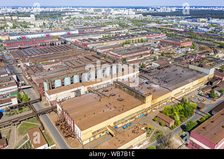 aerial top view of urban industrial district. roofs of factory buildings and warehouses Stock Photo