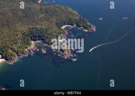 Aerial view of a beautiful Pacific Ocean Coast during a sunny summer morning. Taken in Vargas Island, near Tofino, Vancouver Island, BC, Canada. Stock Photo