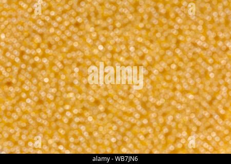 Abstract twinkled yellow, gold bright background with bokeh defocused. Stock Photo