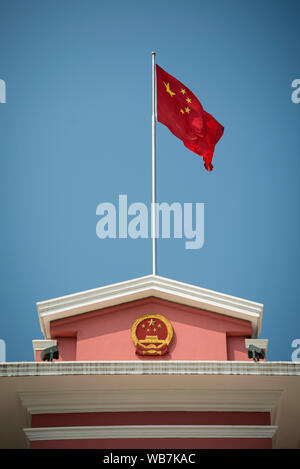 chinese flag on government  headquarters building in macau city china Stock Photo