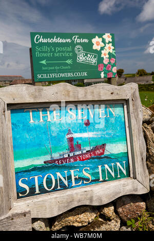UK, England, Scilly Islands, St Martin’s, Higher Town, Seven Stones Inn pub and Scilly Flowers signs Stock Photo