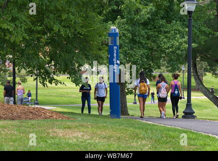 Storrs, CT USA. Aug 2019. Emergency blue phone units with lighting scattered all over the university campus for safety. Stock Photo