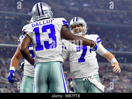 Arlington, Texas, USA. 24th August, 2019. Dallas Cowboys wide receiver Michael Gallup (13) and Dallas Cowboys quarterback Cooper Rush (7) celebrate after a touchdown during an NFL football game between the Houston Texans and Dallas Cowboys at AT&T Stadium in Arlington, Texas. Manny Flores/CSM Credit: Cal Sport Media/Alamy Live News Stock Photo