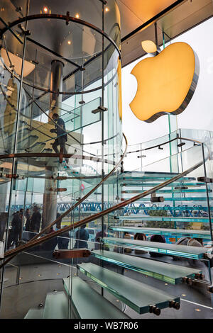 Spiral glass staircase in Apple Store in Central. Hong Kong, China. Stock Photo