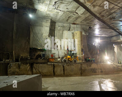 MASSA CARRARA, ITALY - AUGUST 23, 2019: Most marble quarries are open cast type but some are underground. Here is inside of one such. Stock Photo