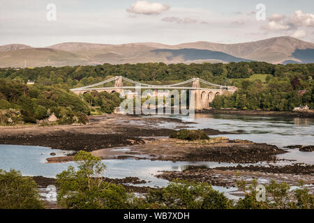 Menai, Anglesey, North Wales - 21st May 2019. The Menai suspension bridge, designed by Thomas Telford and completed in 1826, carries road traffic betw Stock Photo