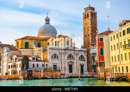 Amazing view of Venice, Italy photographed from a boat on Grand Canal during beautiful sunset. Venice is one of major Italian tourist attractions. Traditional medieval architecture. City on water. Stock Photo