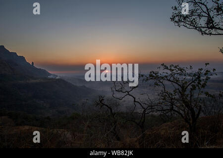 Thana district Maharashtra  March 13-2005 Silhouette of a malshej ghat and mountain ranges in the Western Ghats INDIA asia Stock Photo