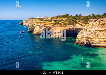 Corredoura Beach, sighted viewpoint on the trail of the Seven Suspended Valleys (Sete Vales Suspensos). Praia da Corredoura with flying seagulls near Stock Photo