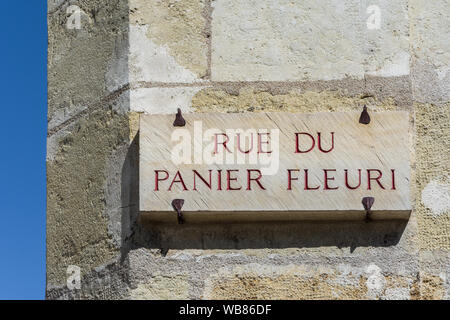 Carved stone signs on Rue du Panier Fleuri (flower basket), Tours, Indre-et-Loire, France. Stock Photo