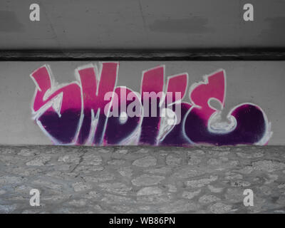 Colorful graffiti on a wall Stock Photo