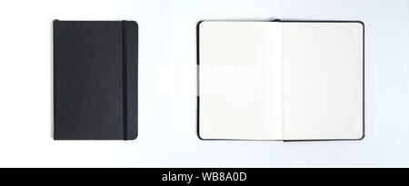 Notebook mock up with clean black blank for design and advertising. Notepad with chromed spring and free copy space template. On the gray background. Stock Photo