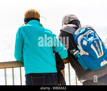 People on the observation deck, Tauranga Bay, New Zealand. With selective focus Stock Photo