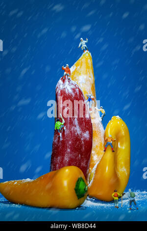 Climbers going up in stormy snow weather, food concept. Stock Photo
