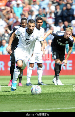 Swansea, UK. 25th Aug, 2019. Borja Baston of Swansea City scores his sides 3rd goal with a penalty during the Sky Bet Championship match between Swansea City and Birmingham City at the Liberty Stadium, Swansea on Sunday 25th August 2019. (Credit: Jeff Thomas | MI News)Editorial use only, license required for commercial use. No use in betting, games or a single club/league/player publications. Photograph may only be used for newspaper and/or magazine editorial purposes Credit: MI News & Sport /Alamy Live News Stock Photo