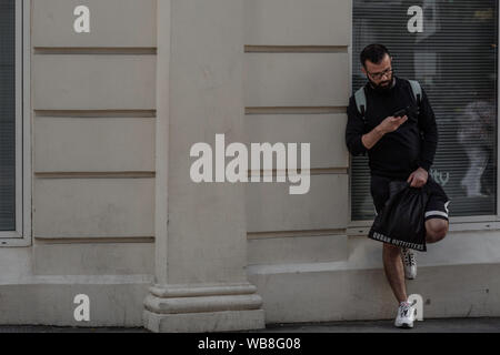 Man browsing his phone. Stock Photo