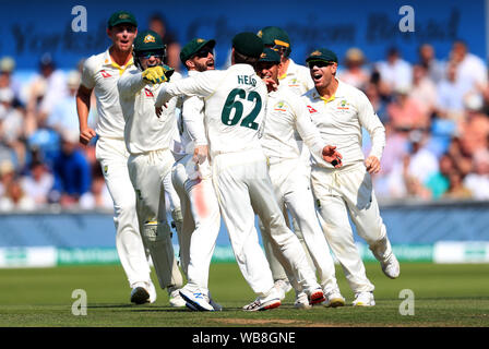 Australia's Travis Head (centre) celebrates running-out England's Jos Buttler during day four of the third Ashes Test match at Headingley, Leeds. Stock Photo