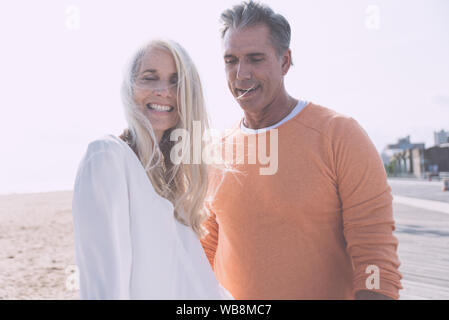 Happy senior couple spending time at the beach. Concepts about love,seniority and people Stock Photo