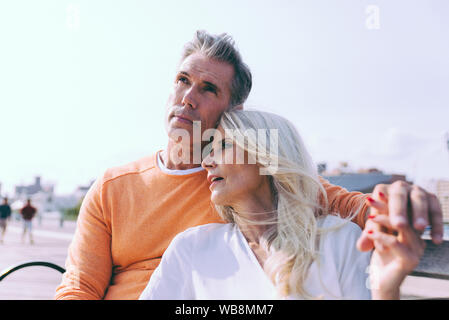 Happy senior couple spending time at the beach. Concepts about love,seniority and people Stock Photo