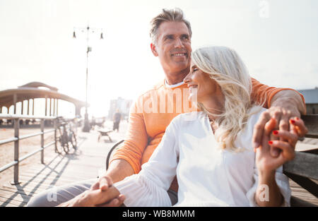 Happy senior couple spending time at the beach. Concepts about love,seniority and people Stock Photo