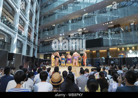 Tokyo, Japan. 25th Aug, 2019. Sumo wrestlers perform in a special Grand Sumo Tournament during the ''Hakkiyoi KITTE'' event held at KITTE commercial complex. Every year, visitors came to see the matches of top-division sumo wrestlers, including grand champions (Yokozuna), in a Tokyo regional tour ''Grand Sumo Tournament at KITTE'' that is held on the final day of the event. The Hakkiyoi KITTE event promotes the sumo culture to visitors to learn and experience Japan's national sport. The event is held at KITTE commercial complex inside the Japan Post building from August 13 to 25. Credit: ZUMA Stock Photo