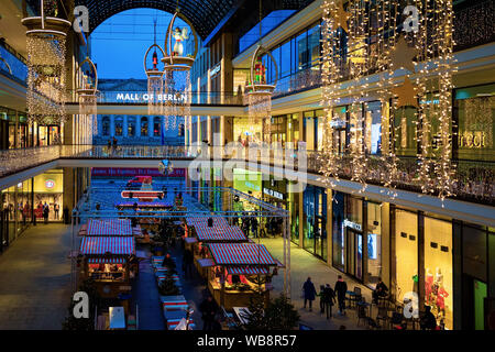 Berlin, Germany - December 12, 2017: Mall of Berlin decorated for Christmas and New Year in Berlin in Germany in Europe at winter. Xmas holiday atmosphere in European city on December. Stock Photo