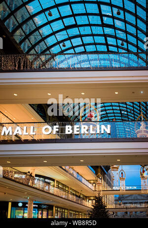 Berlin, Germany - December 12, 2017: Mall of Berlin decorated for Christmas and New Year in Berlin in Germany, Europe in winter. Xmas holiday atmosphere in European city in December. Stock Photo