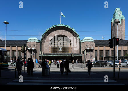 The main entrance and clock tower of Central Railway Station, designed by Eliel Saarinen, in Helsinki, Finland Stock Photo