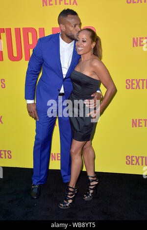 Marlon Wayans and Essence Atkins attending the 'Sextuplets' premiere at Arclight Hollywood on August 7, 2019, in Los Angeles, California Stock Photo