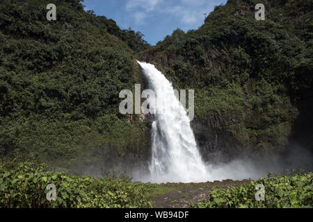 Wide angle landscape of powerful and beautiful Magic Waterfall in tropical forest of Cayambe-Coca Ecological reserve,Napo Province,Ecuador Stock Photo