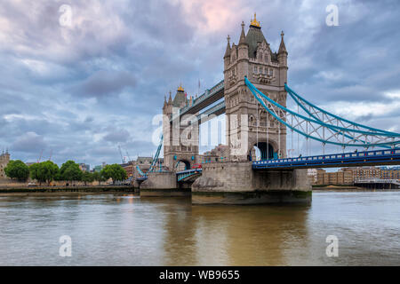 Spectacular Tower Bridge in London, UK at evening time with beautiful clouds. Stock Photo