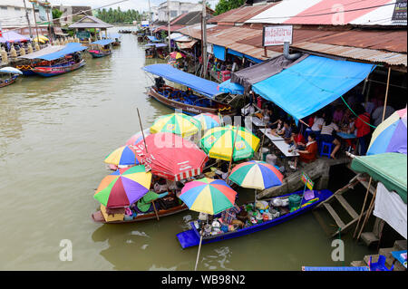 Boats in Amphawa floating market Stock Photo