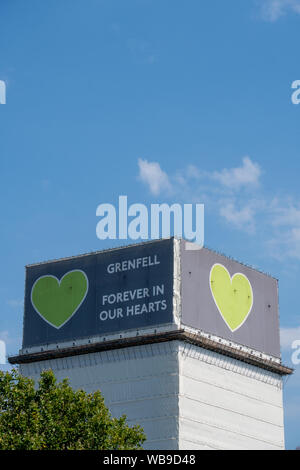 London / United Kingdom - August 25th 2019: Forever in our hearts support banner on the Grenfell tower Stock Photo