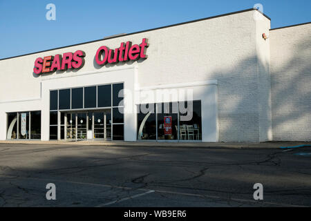 A logo sign outside of a Sears Outlet retail store location in Bridgeville, Pennsylvania on August 9, 2019. Stock Photo
