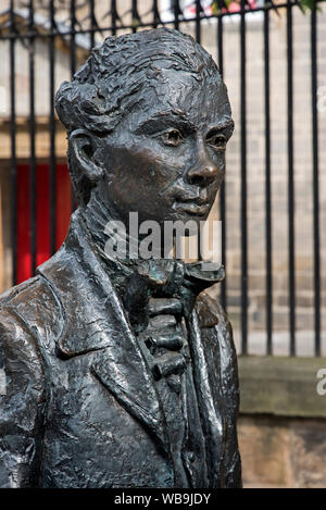 Statue in memory of the Scottish poet Robert Fergusson (1750-74) outside Canongate Kirk in Edinburgh. Stock Photo