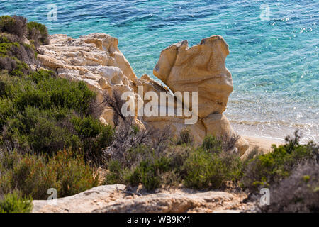 Exotic Platanitsi beach in Sarti, Sithonia, Greece with crystal clear water and spectacular shapes of rocks Stock Photo