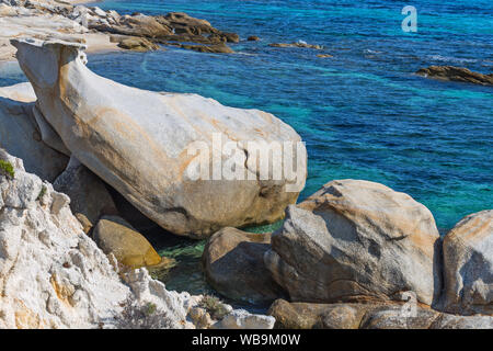 Exotic Platanitsi beach in Sarti, Sithonia, Greece with crystal clear water and spectacular shapes of rocks - the whale and the mermaid head Stock Photo