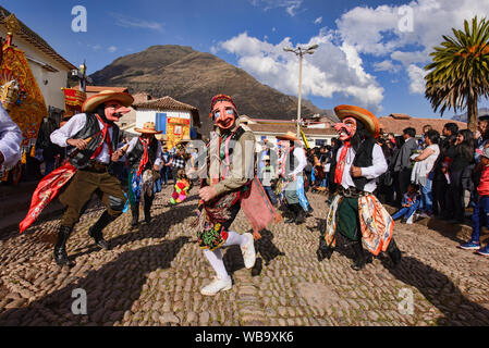 Dancing in the streets at the Virgen del Carmen Festival, held in Pisac and Paucartambo, Peru Stock Photo