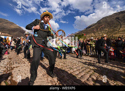 Dancing in the streets at the Virgen del Carmen Festival, held in Pisac and Paucartambo, Peru Stock Photo