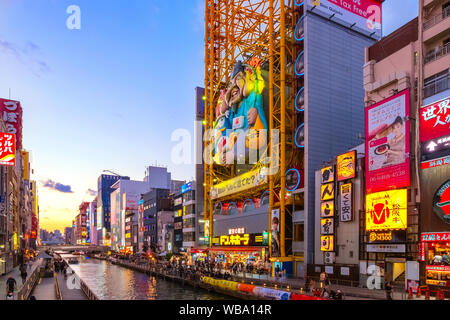 Osaka, Japan - October 28 2018: Dotonbori is one of the most popular tourist destination runs alongside Dotonbori canal between Dotonboribashi and Nip Stock Photo