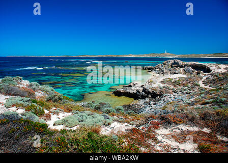 Geordie Bay on the north coast of Rottnest Island, and its clear waters over white sand, with the mainland of Australia some 20 km in the distance. Stock Photo