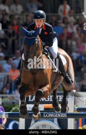 Holly Smith GBR with Hearts Destiny during the Longines FEI