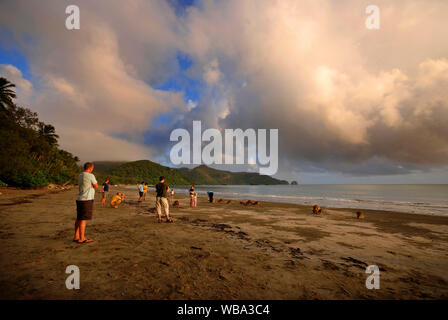 Beachgoers on cloudy day Cape Hillsborough National Park, Queensland, Australia Stock Photo