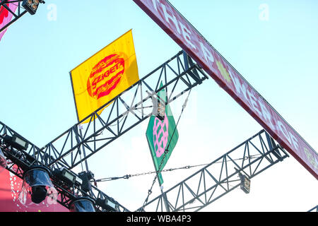 Budapest, Hungary. 09th Aug, 2019. Flag and airplane passing over Sziget Festival 2019. A particular of the main stage (Photo by Luigi Rizzo/Pacific Press) Credit: Pacific Press Agency/Alamy Live News Stock Photo