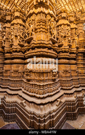 Beautifully carved stone pillars in a Jain temple within Jaisalmer Fort, India. Stock Photo