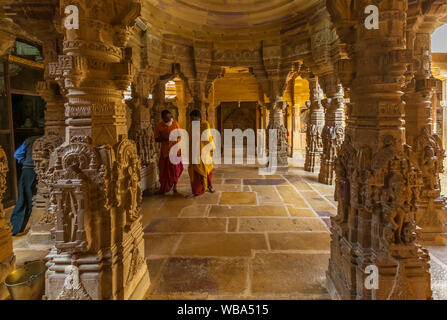 Beautifully carved stone pillars in a Jain temple within Jaisalmer Fort, India. Stock Photo