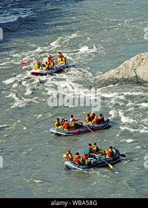 Tourists rafting in rubber boats on the river Abasha in Martvili