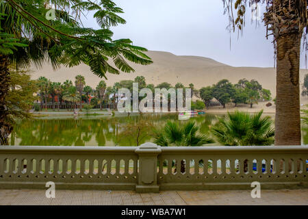 Promenade in Huacachina desert oasis, Ica, Peru Stock Photo