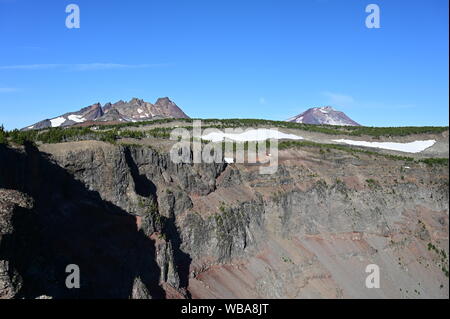 View of Broken Top and South Sister volcanoes from Tam McArthur Rim Trail in Three Sisters Wilderness near Sisters, Oregon. Stock Photo